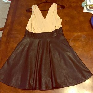 Fun and sexy dress with sheer blush and leather