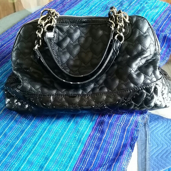 Betsey Johnson heart embossed purse.