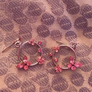 Pink flower earrings.