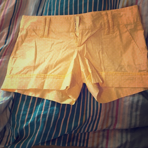 Yellow and white polka dot shorts