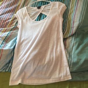 White short sleeve with a small open back area.