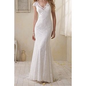 A bran new, unworn Alfred Angelo wedding dress