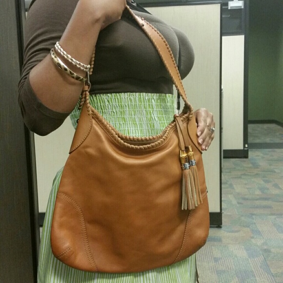 Cognac tassle zip handbag