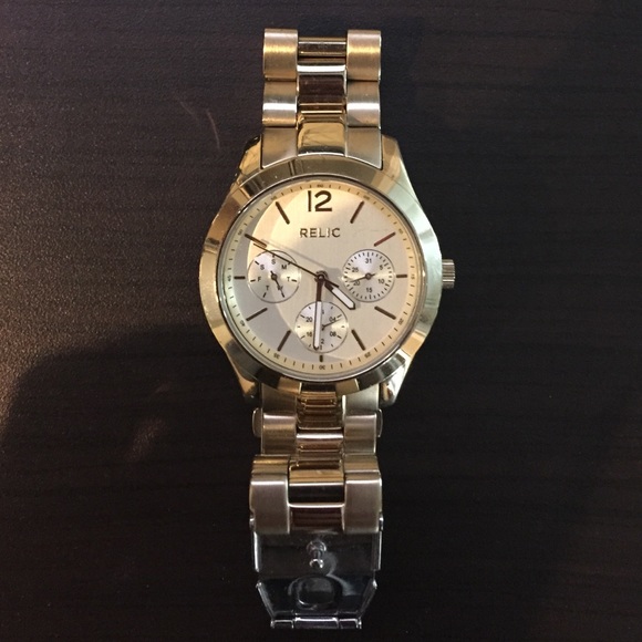 Gold Round Face Relic Watch