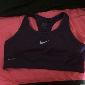 dark purple Nike sports bra.