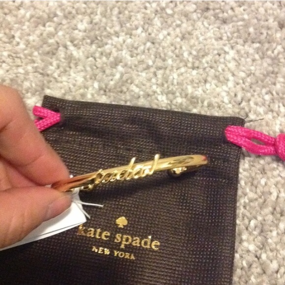 kate spade Jewelry - NWT Kate Spade gold tone idiom bangle. Dainty! kate spade Jewelry - NWT Kate Spade gold tone idiom bangle. Dainty!