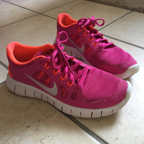 Pink and orange Nike frees