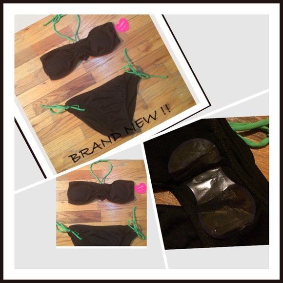 Brand new 2 piece black and green bathing suit
