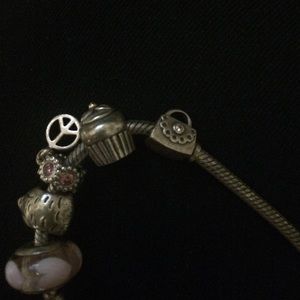 pandora purse & cupcake charm.