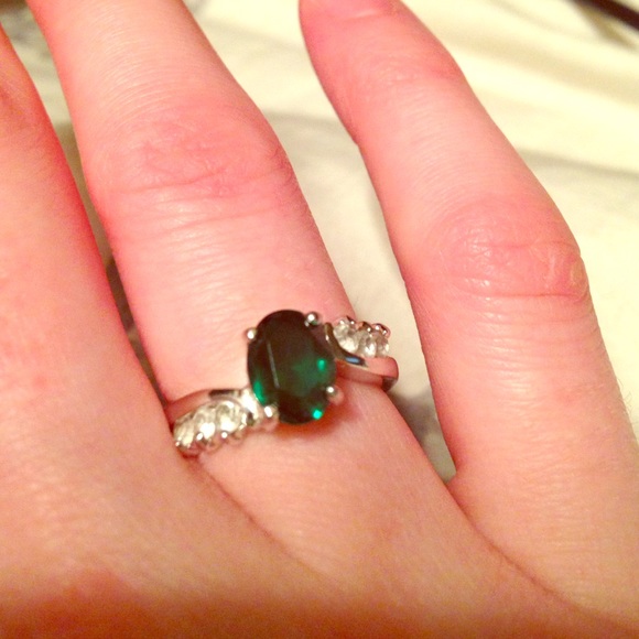 Green stone with rhinestone rings