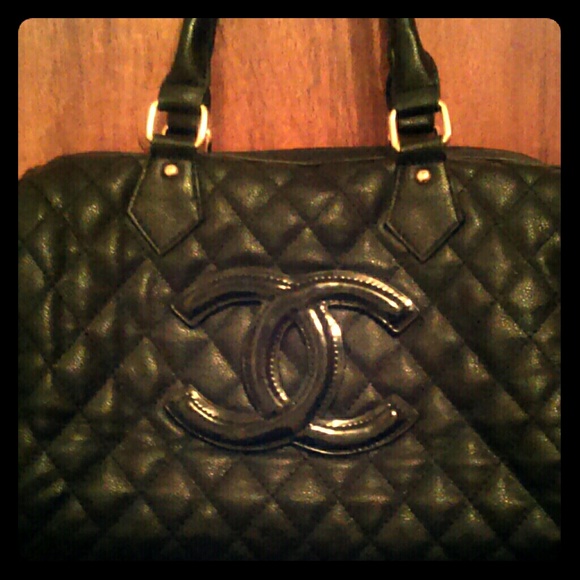 Black leather quilted speedy handbag