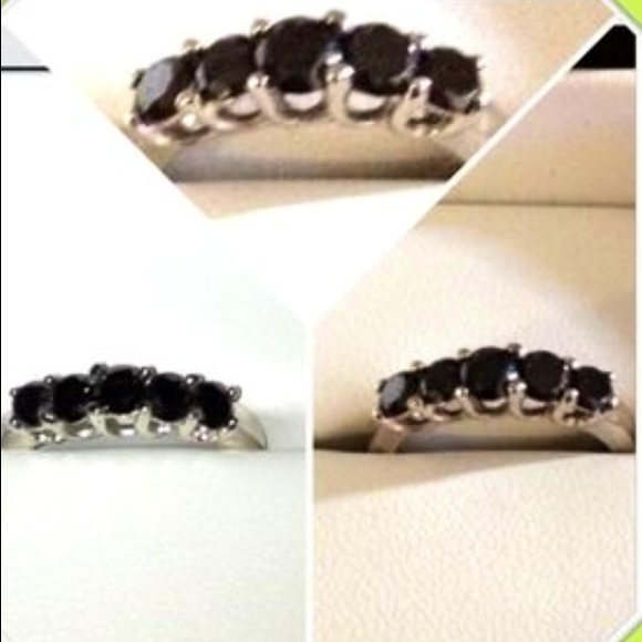 Stamped 10k white gold and 1ctw black diamond ring