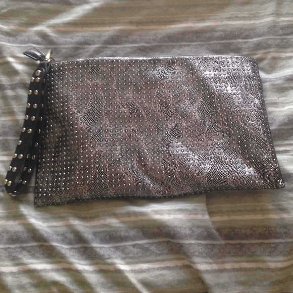 Metallic studded clutch with wrist strap