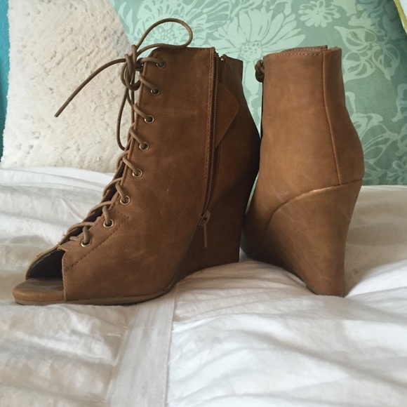 Tan wedge lace up booties