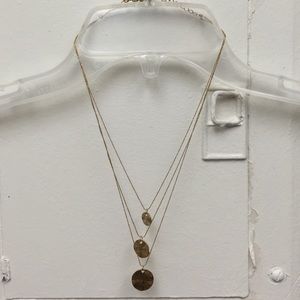 Gold triple layer hammered necklace