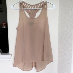 Strappy nude sheer high-low tank
