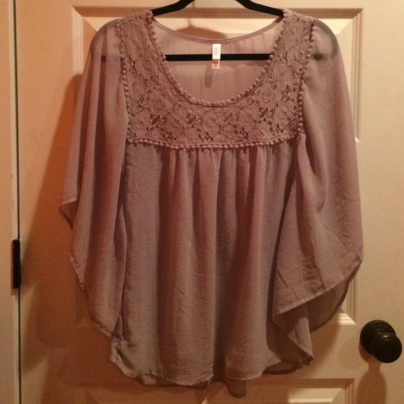 Butterfly sleeve shirt.