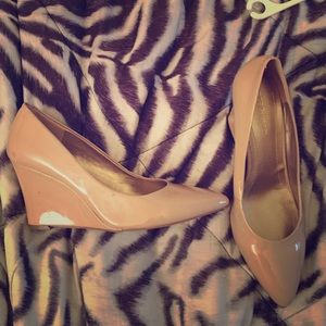 These are beiged wedged heels about 3 inches high