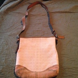 Pink and brown coach bag.