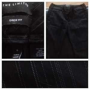 The limited black and white pinstripe dress pants
