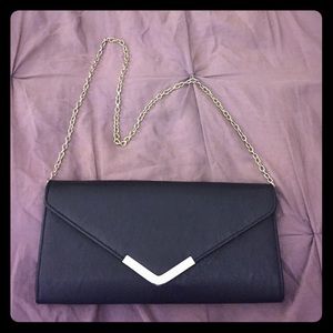 Black faux leather, strappy, envelope Clutch