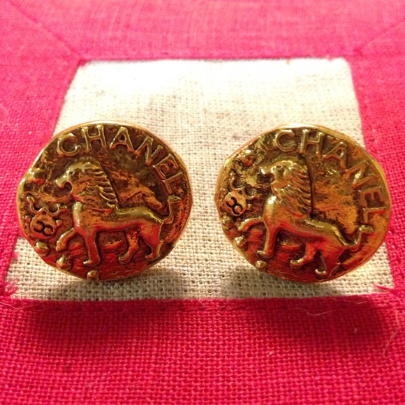 Authentic CHANEL vintage gold lion earrings.