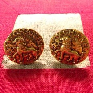 Authentic CHANEL vintage gold lion earrings.