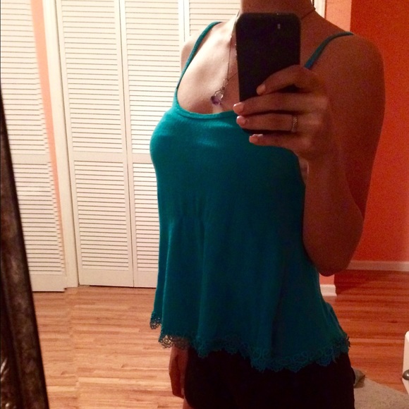 Flowy teal crop top with lace trim