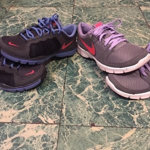 Bundle of two Nike running sneakers.