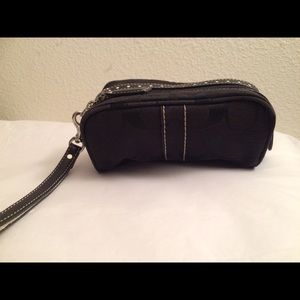 💯% Black coach cosmetic bag