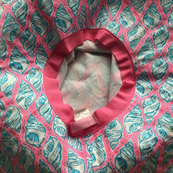 Lilly Pulitzer hat in a little tipsy print.