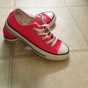 Hot pink converse.