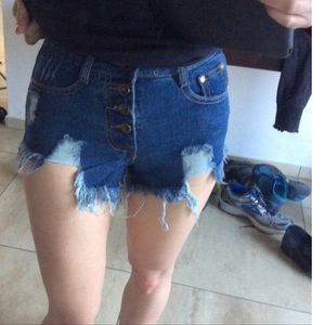 Ripped shredded denim cut off mid rise shorts