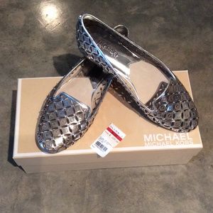 Michael Kors silver flats.