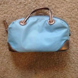 Blue and gold makeup bag