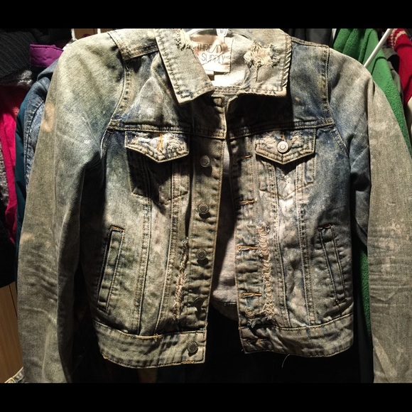 Distressed denim jacket