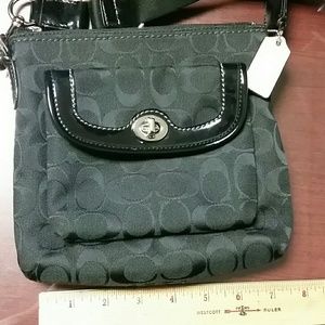 Coach cross body purse.