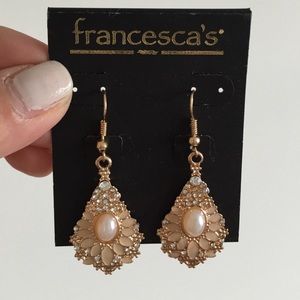 Francesca's crystal peach pearl drop earrings.