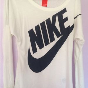 long sleeved white and navy blue nike shirt