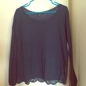 Long sleeved blue shirt with lace back.