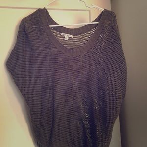 Sage colored knitted top with braided shoulders
