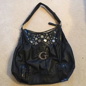 Black guess purse with large detailed gems