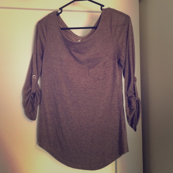 Light brown shirt with pocket & buttoned sleeved