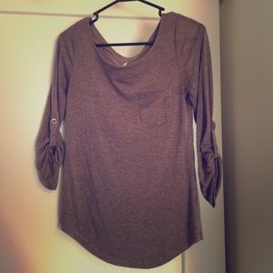 Light brown shirt with pocket & buttoned sleeved