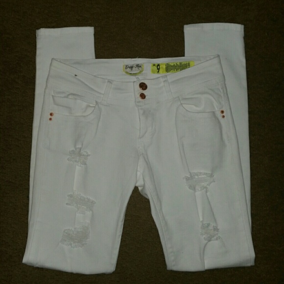 Distressed white skinnies