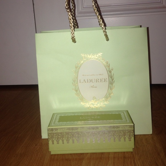 green Ladurée Paris bag and macaroon box