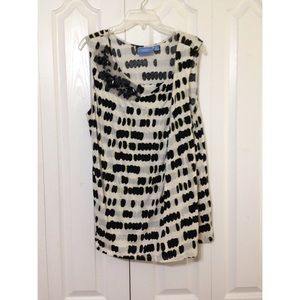 Black and cream sleeveless blouse