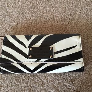 Kate spade wallet. All offers will be considered.
