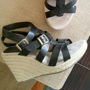 Decree faux leather wedge sandals.