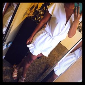 White Romper with ruffled bottom! Size Small